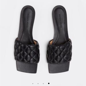 Bottega Veneta brand black leather slides